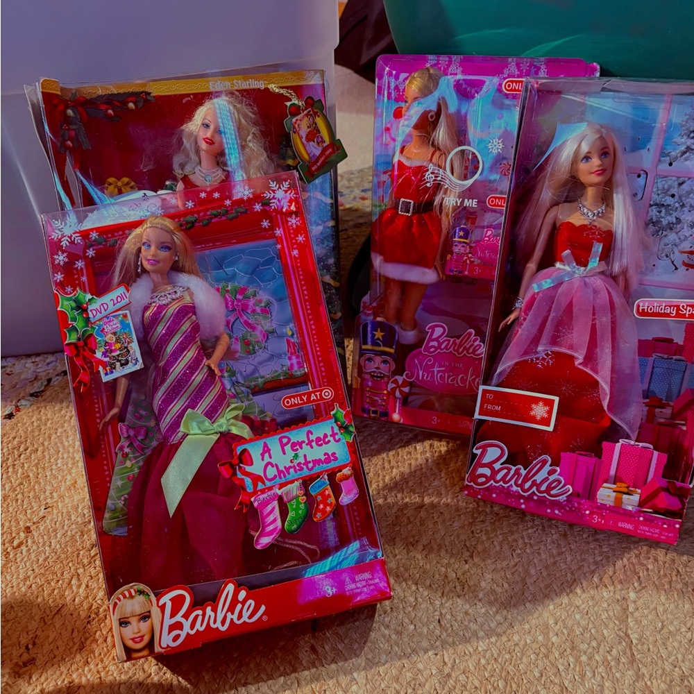 Barbie’s -Lot of 4 Christmas Barbie’s